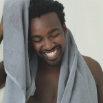 DOVE MEN + CARE Body and Face Scrub Charcoal + Clay Body Wash for Men with 24-Hour Nourishing Micromoisture Technology 30 oz - Image 3