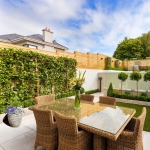 2 x Artificial Rattan Patio Planters Purple and White Faux Silk Pansies with Conifer/Cedar Topiary ideal for Home, Patio, Garden Outdoor Living 60cm/23.5in - Image 3